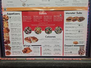 Offers vegan appetizers, subs, and dessert at Monster Pizza in Deltona