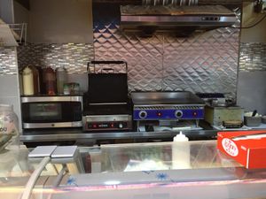 The grill and the fryer at 3rd Ave Deli and Grocery in New York City