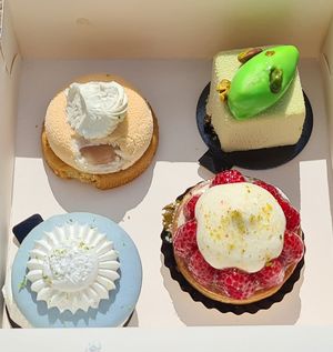 Peach, pistachio, blueberry macarons, raspberry tart at La Pâtisserie Vegan - Les Saveurs De La Bastille in Liege