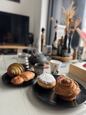 Pistachio croissant, cougnou, boule de berlin, cruffin  at La Pâtisserie Vegan - Les Saveurs De La Bastille in Liege