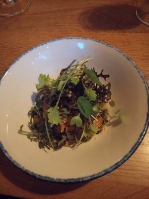 Too dark to take many photos. This dish was a pumpkin salad. Very unique and flavoursome. at Bistro Lupa in Copenhagen