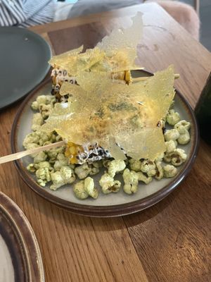 Danish corn cob over pickle seasoned popcorn  at Bistro Lupa in Copenhagen