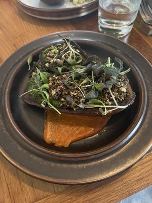 Eggplant steaks with crunchy quinoa and a balsamic reduction  at Bistro Lupa in Copenhagen