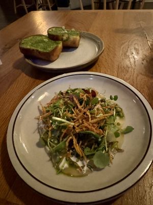 (Soy) milk bread with ramsons pesto and a delicate finely sliced Al dente potato salad   at Bistro Lupa in Copenhagen
