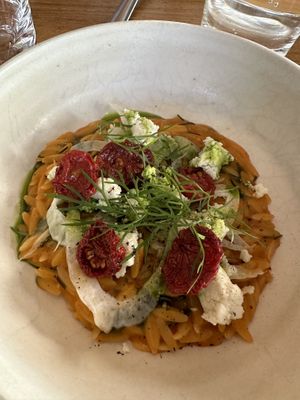 Tomato risotto with cashew ricotta and sun dried tomatoess  at Bistro Lupa in Copenhagen