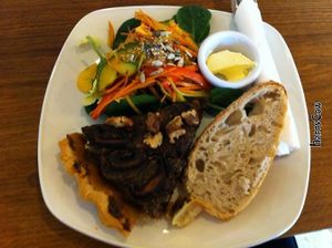 Mushroom and leek tart with salad and artisan bread. at The Beech Cafe in Petersfield