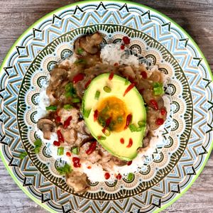 Loco Moco Remix - quinoa rice, beyond burger OR sweet potato croquette, mushroom gravy, avo at Vegan City Hawai'i in Honolulu