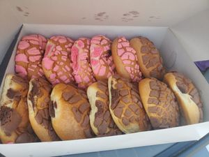 Chocolate and strawberry conchas at Panaderia y Pasteleria la Mexicana in La Habra