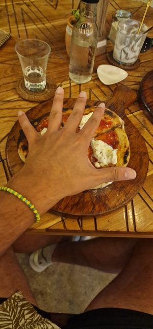 Pizza smaller than my hand at Italdo  in Tulum
