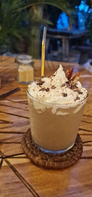 Vegan banana shake with vegan whipped cream at Italdo  in Tulum