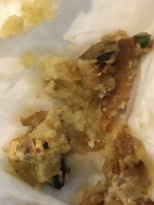 I pulled out one piece of chikn from my burrito and this is how much garlic was on it!  at The Happy Hooligans in Berkeley