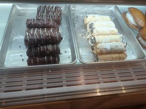 Chocolate-covered and traditional cannoli at DC Vegan in Washington