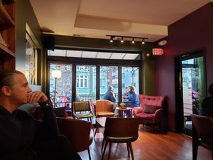 Nice casual seating with bar downstairs at DC Vegan in Washington