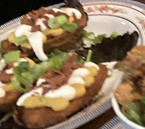 Potato skins (sorry for the bad quality photo I had to crop it from a different photo)  at DC Vegan in Washington