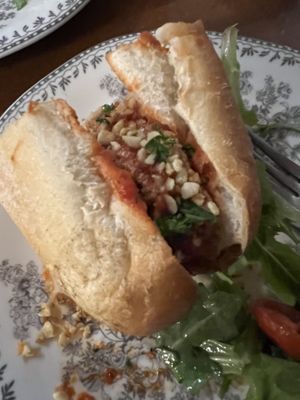 A shared portion of a meatball sub  at DC Vegan in Washington