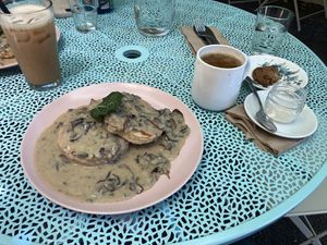 Biscuits and mushroom gravy   at Acorn Community Cafe in Eugene