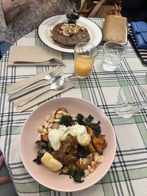 Autumn has, banana buckwheat pancakes, house made juice  at Acorn Community Cafe in Eugene
