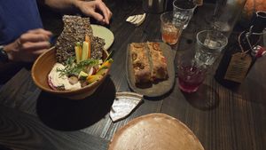 Foccacia, white bean hummus with linen seed crackers and crudites at Fat Veggies in Barcelona