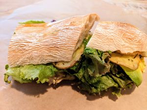 Green Dream is our popular vegan sandwich.  It has olive tapenade, artichoke, roasted potato, chili oil and avocado. at Fox and Lion Bread in San Francisco