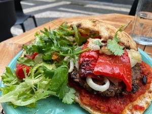 Signature Vegan Dish burger. Home made bread, slow maturation, infused with extra virgin olive oils & tons of spices. Here is anything that Hospital flavored food! at Intz48 Coffee Roasters Azores in Sao Miguel