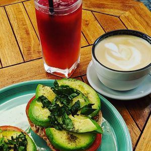 Avocado toast, flat white & Beetroot / Orange/ Ginger juice at Intz48 Coffee Roasters Azores in Sao Miguel