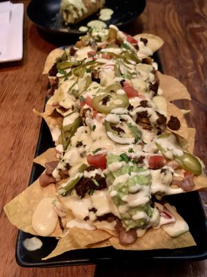 Vida Nachos cashew queso,Vida-chorizo,beans,creama,guacamole❤️ at Vida Cantina SF in San Francisco