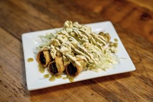 Moms Taquitos:potatoe, mushroom, caramelized onion, queso fresco,creama,cabbage,salsa verde' at Vida Cantina SF in San Francisco