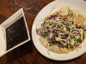 Veggie taco and side of black beans at Vida Cantina SF in San Francisco