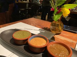 Salsas for chips & salsa: verde,  mango habanero, and roja at Vida Cantina SF in San Francisco