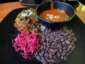 Birria tacos with consomme  at Vida Cantina SF in San Francisco
