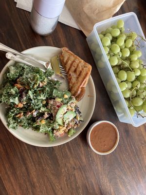 Pizza Pop Panini, Kale Salad, Broken Burrito Bowl, tomato soup.   at Mondays Plant Café in Calgary