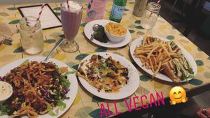 Pictured: BBQ ranch salad, nachos, Mac& cheese, chicken avocado triple decker  at Saturn Cafe in Berkeley