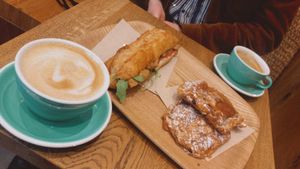 Cafe latte, allongé, sandwich with vegan ‘chicken’, mayonaise, lettuce & tomato and almond / chocolate viennoisseries  at Land & Monkeys - Roquette in Paris