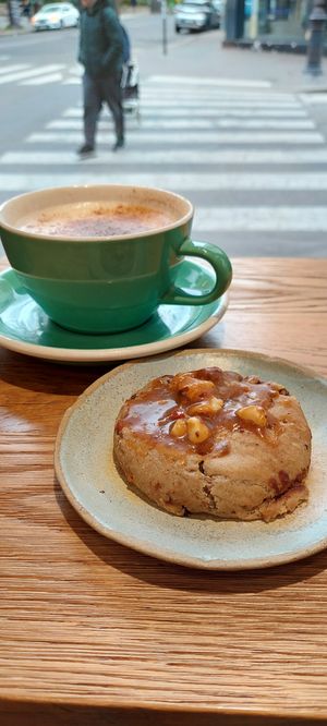A chai latte and the monkey cookie at Land & Monkeys - Roquette in Paris