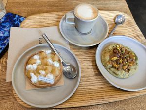Lemon and meringue tartlet and pistacho cookie. at Land & Monkeys - Roquette in Paris