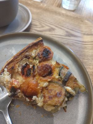 Already half eaten quiche at Land & Monkeys - Roquette in Paris