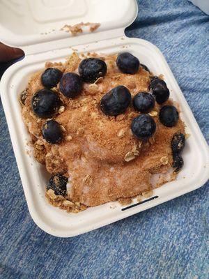 Raspberry frosting with blueberries and pie crust at Cinnaholic in Berkeley