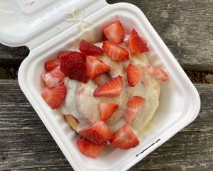 roll with almond frosting and strawberries at Cinnaholic in Berkeley