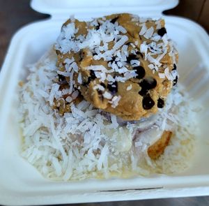 Roll with cookie dough and coconut topping (custom) at Cinnaholic in Berkeley