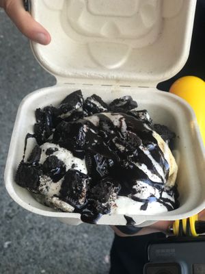 Old fashioned roll with chocolate syrup and oreo pieces  at Cinnaholic in Berkeley