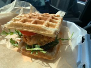 Chicken and waffle sandwich with maple aioli  at Lucky Lemon Bakery in Kokomo