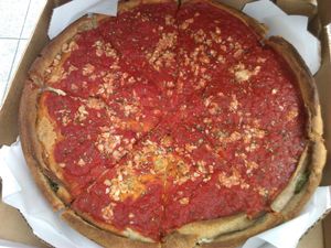 Vegan pizza by Patxi's.  14 inches with spinach, garlic, tomato sauce, and Daiya cheese. at Patxi's Pizza - Hayes Valley in San Francisco