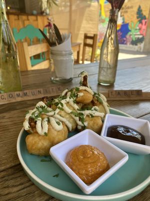 Cauliflower wings with homemade sauces 🤤   at Yum Yum San Pancho in San Francisco