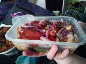 Garlic and coriander chicken with some salt and pepper vegan fish on top at Hong Kong Vegan in Wakefield