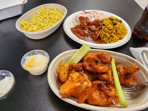 Mac and cheese, cali wings, chicken and rice plate at Earth To Us in Raleigh