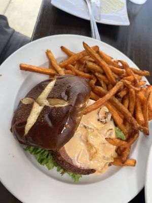 Impossible burger with sweet potato fries  at Earth To Us in Raleigh