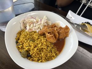 Chikn and yellow rice with coleslaw   at Earth To Us in Raleigh