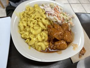 Mac and cheese with chikn with coleslaw   at Earth To Us in Raleigh