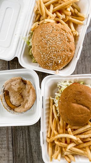 Burgers and fries + peach cobbler  at The Trashy Vegan in Asheville