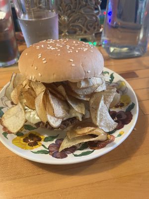 Chip Burger- Impossible patty, provolone cheese, potato chips, zesty sauce, onion and pickle    at The Trashy Vegan in Asheville